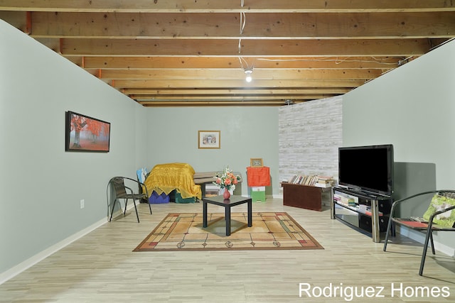 2106 Cranbrook Dr NE, Grand Rapids, MI 49505 - sitting room featuring beam ceiling and wood finished floors