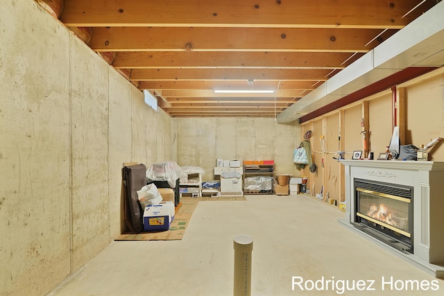 2106 Cranbrook Dr NE, Grand Rapids, MI 49505 - basement featuring a glass covered fireplace