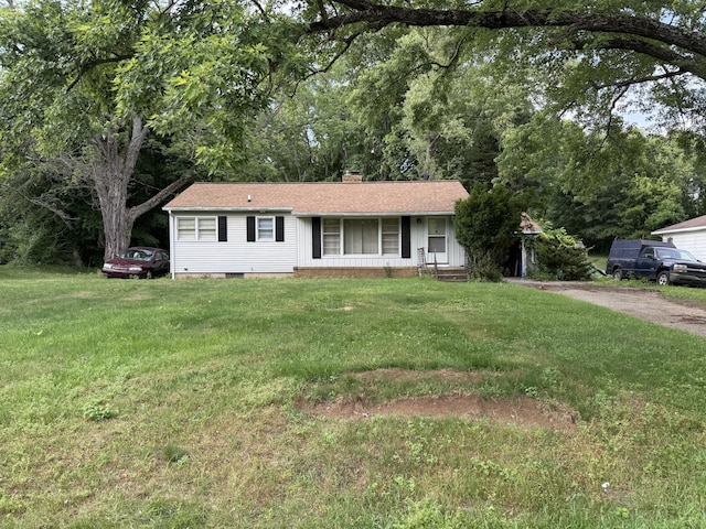 6429 Wendell St SE, Grand Rapids, MI 49546 - ranch-style house featuring a chimney, a front yard, roof with shingles, and crawl space