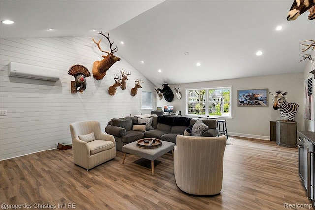 586 Fairfax St, Birmingham, MI 48009 - living room featuring lofted ceiling, wood finished floors, recessed lighting, a wall unit AC, and wooden walls
