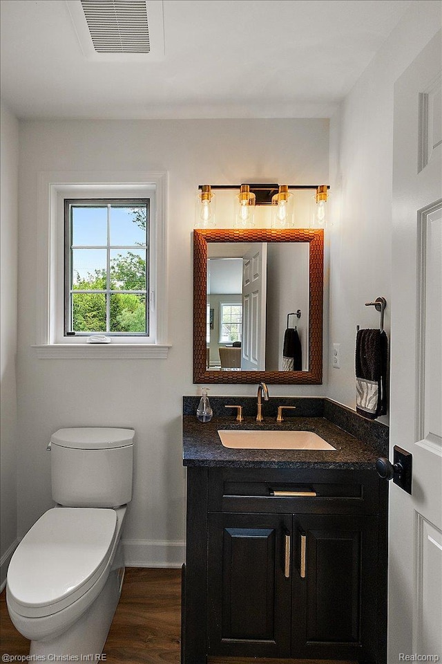 586 Fairfax St, Birmingham, MI 48009 - bathroom with vanity and wood finished floors