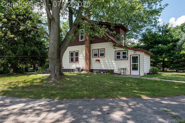 20525 30 Mile Rd, Ray, MI 48096 - view of side of home featuring a yard