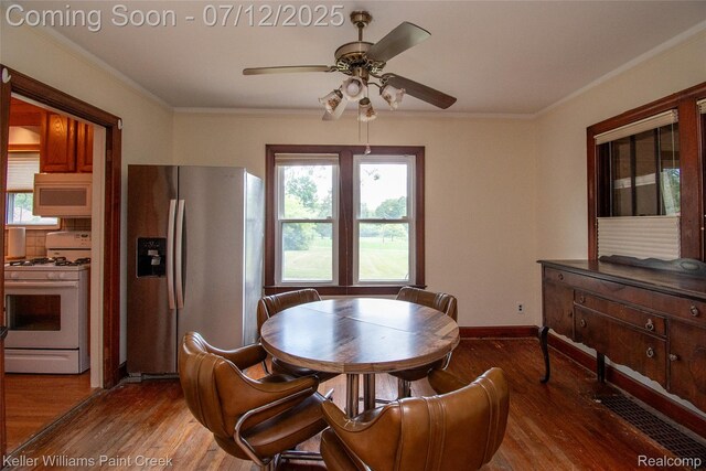 20525 30 Mile Rd, Ray, MI 48096 - dining area with wood finished floors, ornamental molding, and ceiling fan