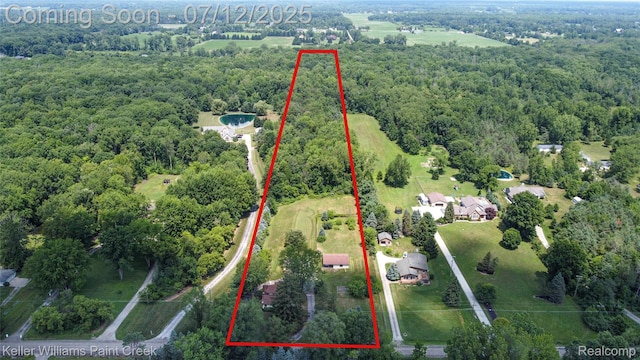 20525 30 Mile Rd, Ray, MI 48096 - aerial overview of property's location with a heavily wooded area and property boundaries highlighted