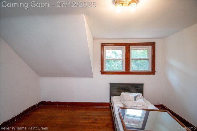 20525 30 Mile Rd, Ray, MI 48096 - unfurnished bedroom featuring wood finished floors and lofted ceiling