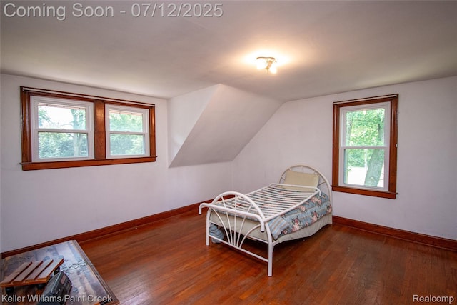 20525 30 Mile Rd, Ray, MI 48096 - bedroom with multiple windows, wood-type flooring, and vaulted ceiling
