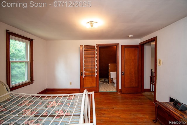20525 30 Mile Rd, Ray, MI 48096 - unfurnished bedroom featuring wood finished floors and ensuite bath