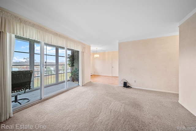 5980 Alan Dr Unit 6, Brighton, MI 48116 - carpeted spare room featuring crown molding and a chandelier