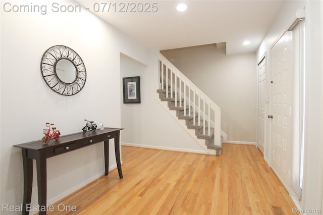 33234 Walnut Ln, Farmington Hills, MI 48334 - entryway featuring stairway, wood finished floors, and recessed lighting