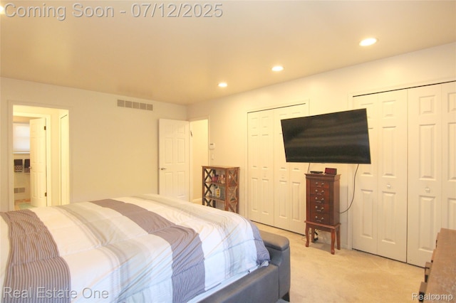 33234 Walnut Ln, Farmington Hills, MI 48334 - bedroom featuring multiple closets, light carpet, and recessed lighting