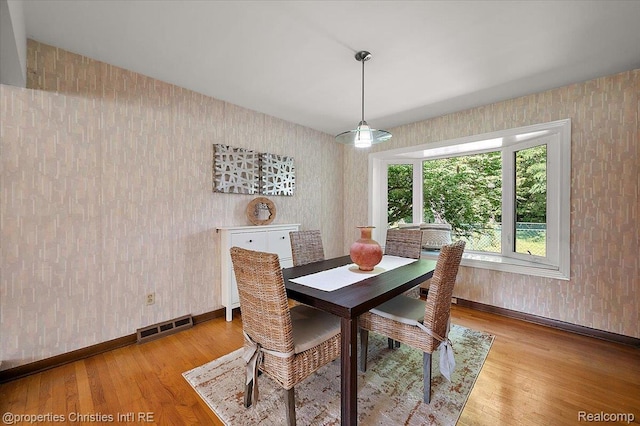 30700 Marimoor St, Beverly Hills, MI 48025 - dining room with wood finished floors and wallpapered walls
