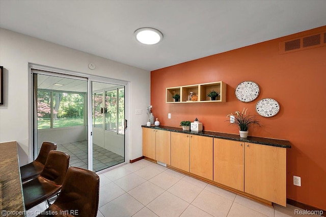 30700 Marimoor St, Beverly Hills, MI 48025 - interior space featuring dark countertops, open shelves, and light tile patterned floors