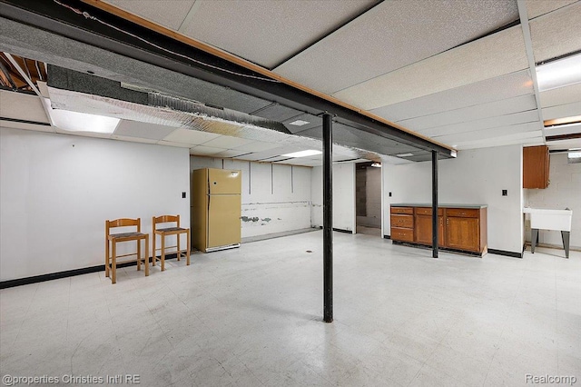 30700 Marimoor St, Beverly Hills, MI 48025 - finished below grade area with freestanding refrigerator and tile patterned floors