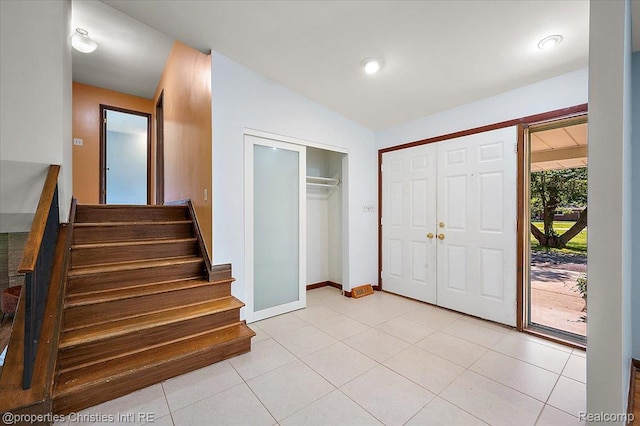 30700 Marimoor St, Beverly Hills, MI 48025 - foyer entrance with lofted ceiling, stairway, and light tile patterned floors
