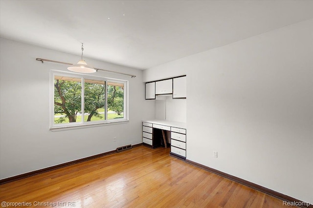 30700 Marimoor St, Beverly Hills, MI 48025 - spare room with light wood-style flooring and built in study area