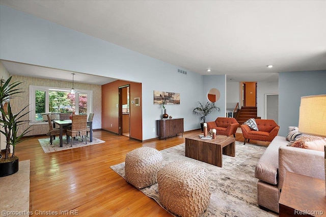 30700 Marimoor St, Beverly Hills, MI 48025 - living area with light wood finished floors, recessed lighting, and stairs