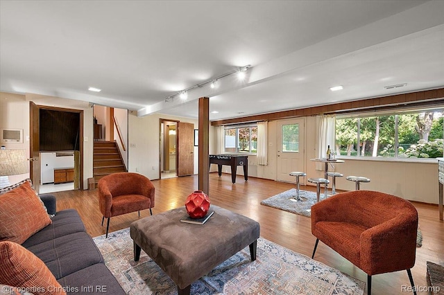 30700 Marimoor St, Beverly Hills, MI 48025 - living room featuring light wood finished floors, stairway, and rail lighting