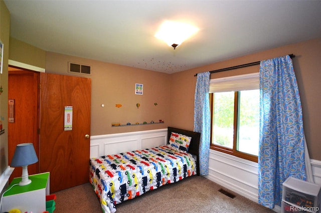 10010 Orchard Ridge Ct, Holly, MI 48442 - bedroom featuring carpet floors and a wainscoted wall