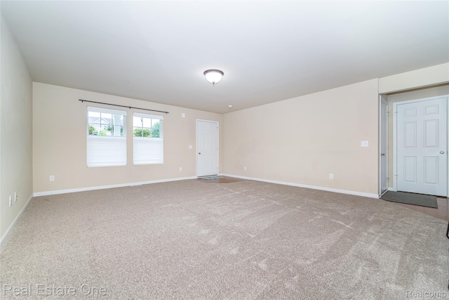750 Dewars St, Howell, MI 48843 - empty room with carpet and baseboards