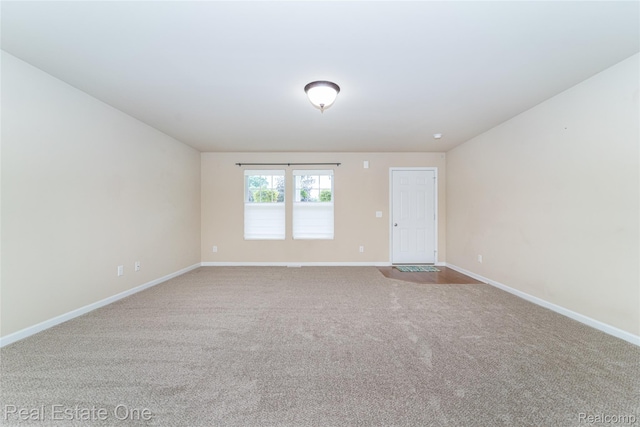 750 Dewars St, Howell, MI 48843 - spare room with carpet flooring