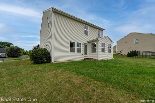 750 Dewars St, Howell, MI 48843 - back of property with entry steps