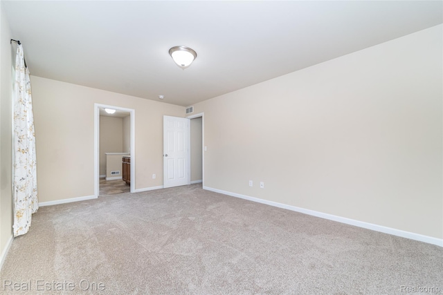 750 Dewars St, Howell, MI 48843 - unfurnished bedroom featuring carpet flooring and ensuite bathroom