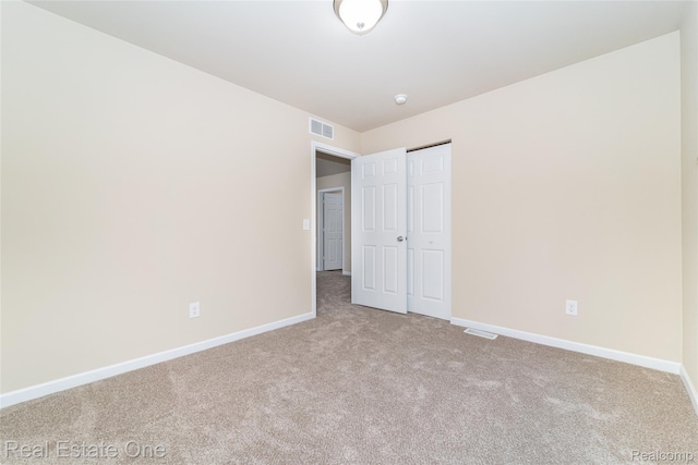 750 Dewars St, Howell, MI 48843 - unfurnished bedroom with carpet flooring and a closet
