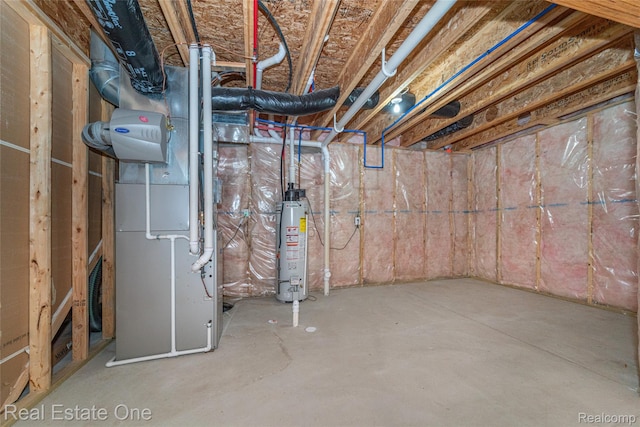 750 Dewars St, Howell, MI 48843 - unfinished below grade area featuring water heater and heating unit