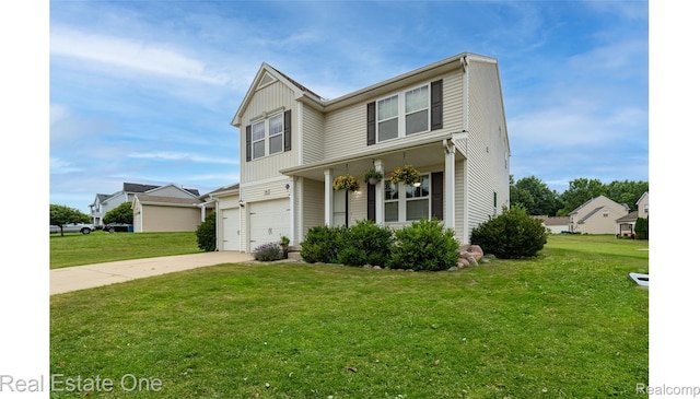 750 Dewars St, Howell, MI 48843 - traditional-style home featuring an attached garage, driveway, and a front lawn