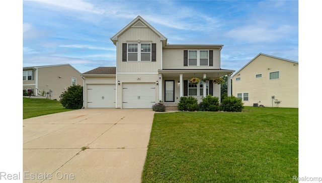 750 Dewars St, Howell, MI 48843 - view of front facade featuring driveway, a front lawn, a porch, and an attached garage