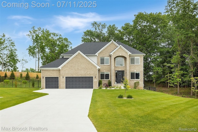 460 Lake Manitou Trl, Oxford, MI 48371 - view of front facade with driveway, a garage, and brick siding