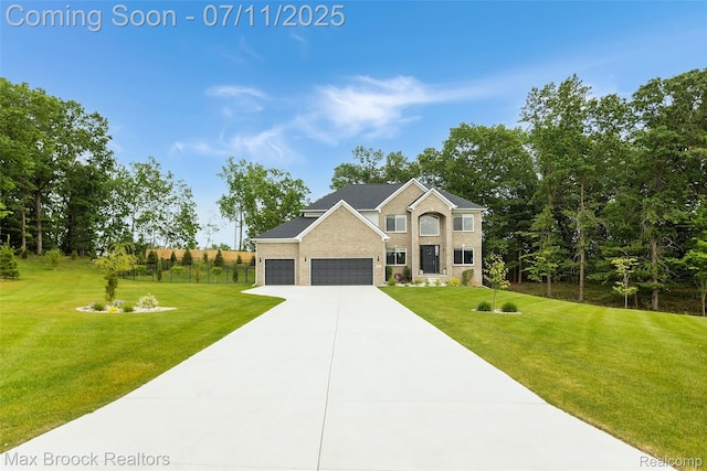 460 Lake Manitou Trl, Oxford, MI 48371 - view of front of property featuring a front yard, driveway, a garage, and brick siding