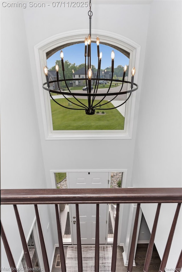 460 Lake Manitou Trl, Oxford, MI 48371 - detailed view of a chandelier and wood finished floors