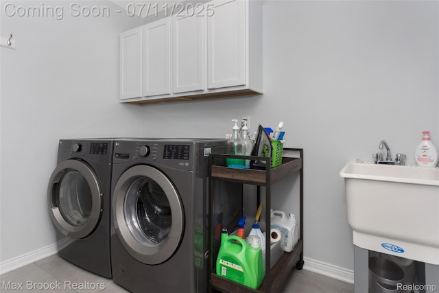 460 Lake Manitou Trl, Oxford, MI 48371 - washroom with washer and clothes dryer, cabinet space, and tile patterned flooring