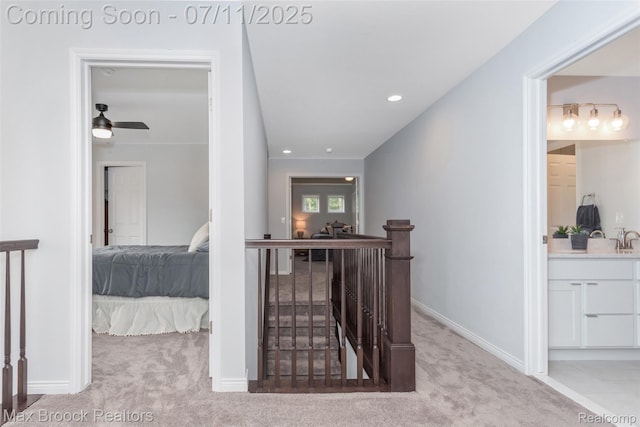 460 Lake Manitou Trl, Oxford, MI 48371 - hallway with carpet floors, an upstairs landing, and recessed lighting