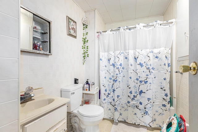 1638 Cherry St, Niles, MI 49120 - bathroom featuring tile walls, vanity, and a shower with shower curtain