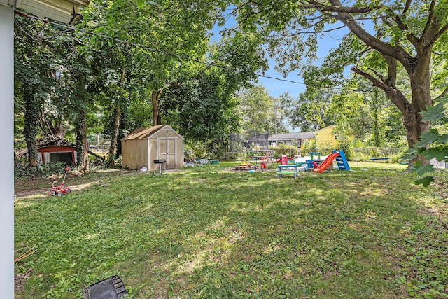 1638 Cherry St, Niles, MI 49120 - view of yard featuring a storage shed and a playground