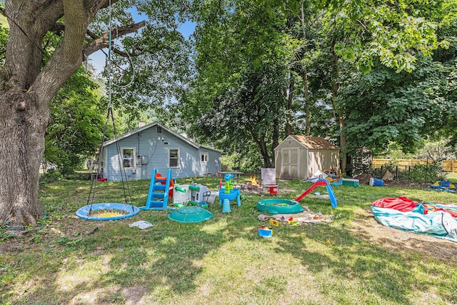 1638 Cherry St, Niles, MI 49120 - view of green lawn with a storage shed and view of scattered trees
