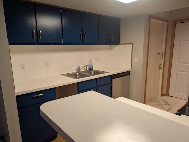 149 Selkirk Ct Unit A, Kalamazoo, MI 49006 - kitchen featuring blue cabinets, stainless steel dishwasher, light countertops, and light colored carpet