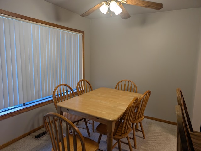 149 Selkirk Ct Unit A, Kalamazoo, MI 49006 - dining space with light colored carpet and ceiling fan