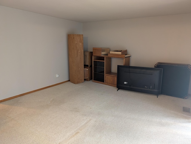 149 Selkirk Ct Unit A, Kalamazoo, MI 49006 - spare room with light carpet and baseboards