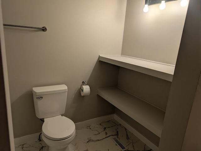 149 Selkirk Ct Unit A, Kalamazoo, MI 49006 - bathroom with baseboards and marble finish flooring