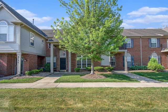 3132 Primrose Ln, Ypsilanti, MI 48197 - multi unit property with a front lawn and brick siding