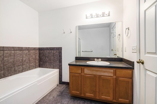 3132 Primrose Ln, Ypsilanti, MI 48197 - full bath featuring vanity, a garden tub, and tile patterned flooring