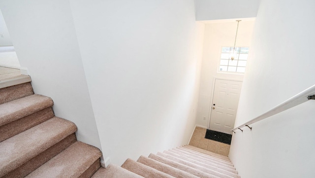 3132 Primrose Ln, Ypsilanti, MI 48197 - stairs with a chandelier