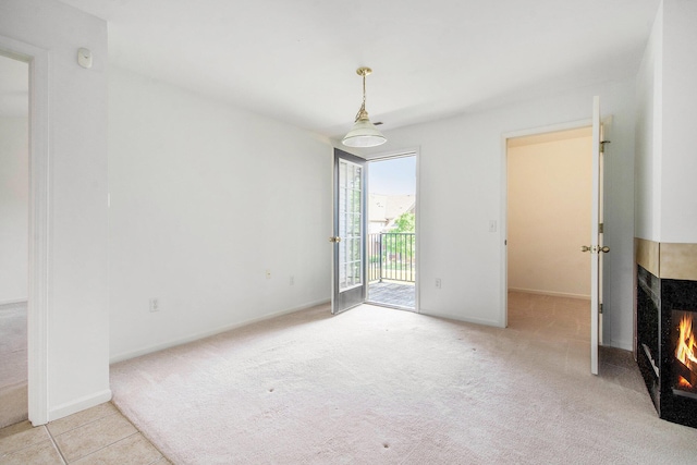 3132 Primrose Ln, Ypsilanti, MI 48197 - unfurnished living room featuring carpet and baseboards
