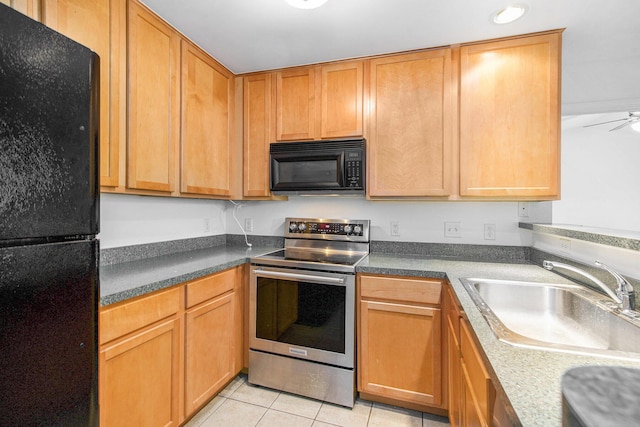 3132 Primrose Ln, Ypsilanti, MI 48197 - kitchen featuring black appliances and light tile patterned floors
