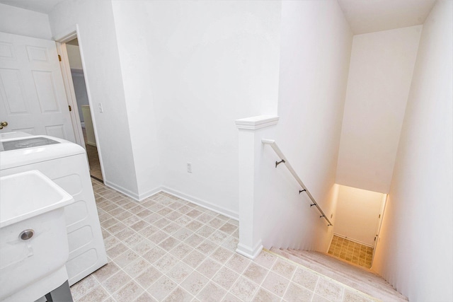 3132 Primrose Ln, Ypsilanti, MI 48197 - washroom featuring washer and clothes dryer and baseboards