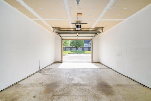 3132 Primrose Ln, Ypsilanti, MI 48197 - garage featuring a garage door opener