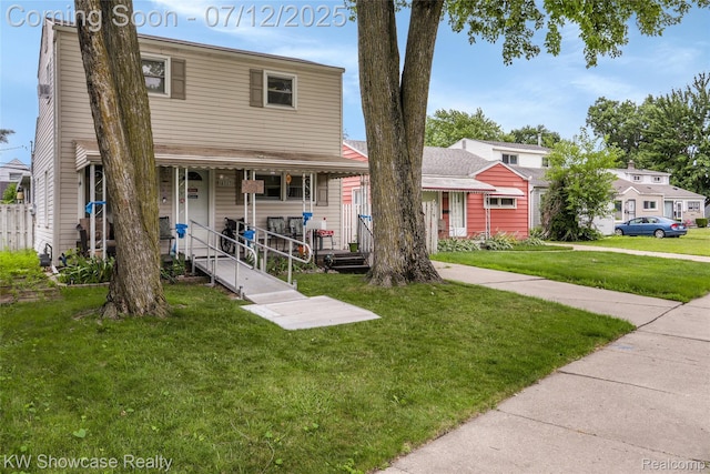 4313 S Dearborn St, Melvindale, MI 48122 - view of front facade featuring a porch and a front yard